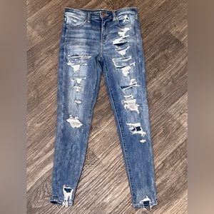 blue ripped high rise jeans